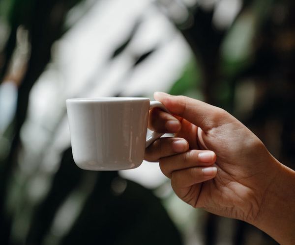 Person enjoying a moment of peace and energy outdoors